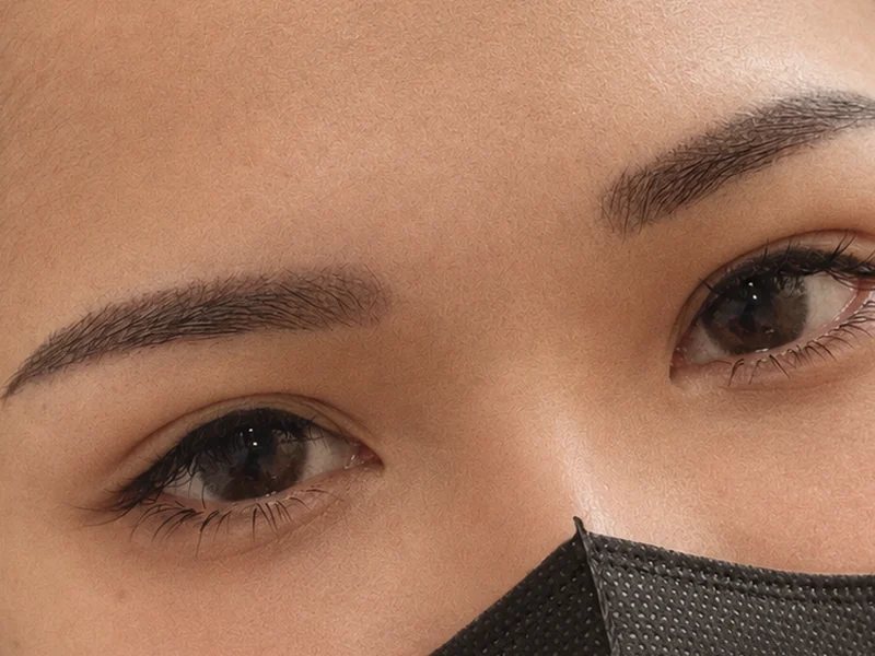 Brow close-up: a pair of brows in daylight