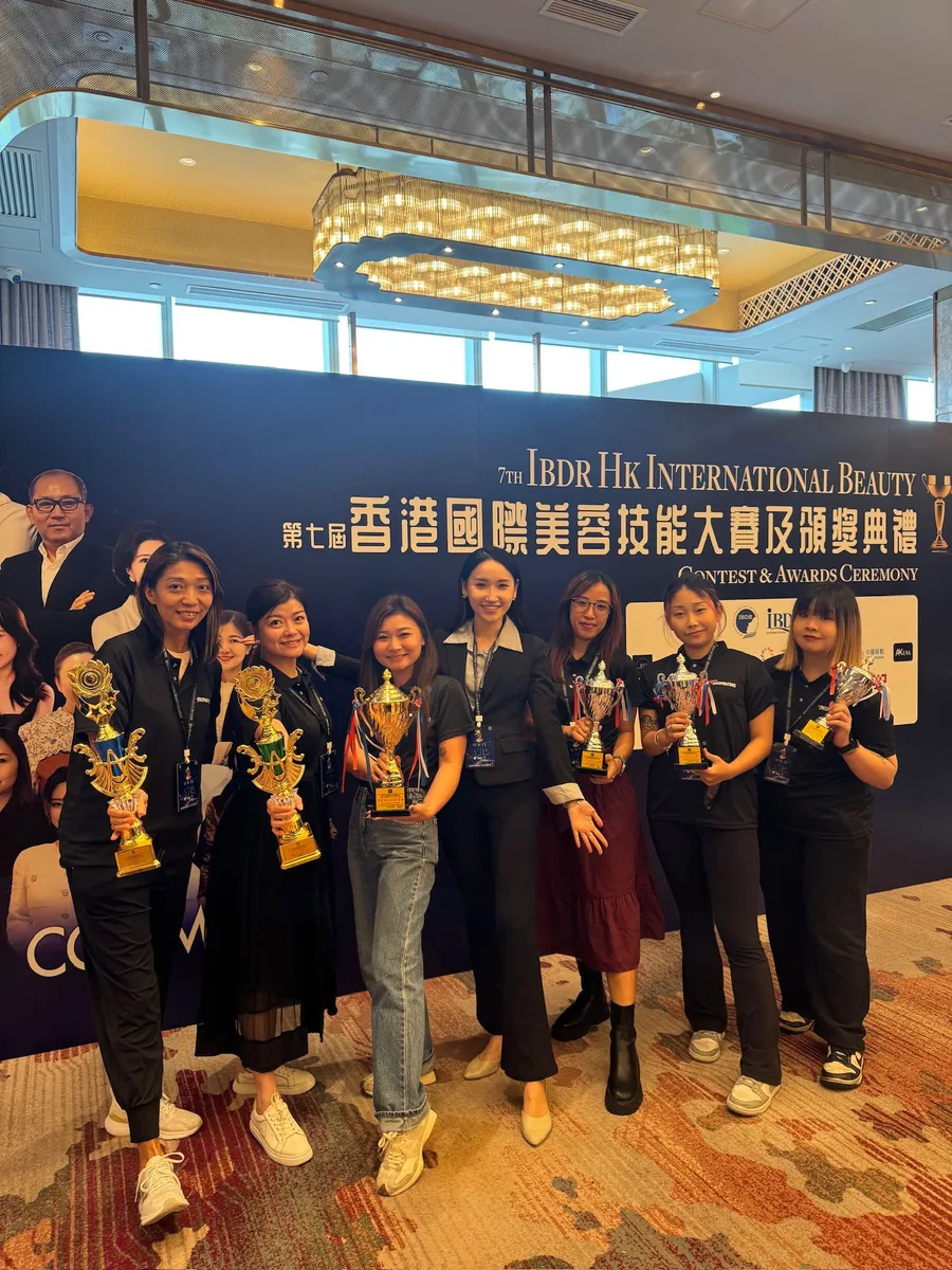 Iris with award-winning students at the IBDR competition