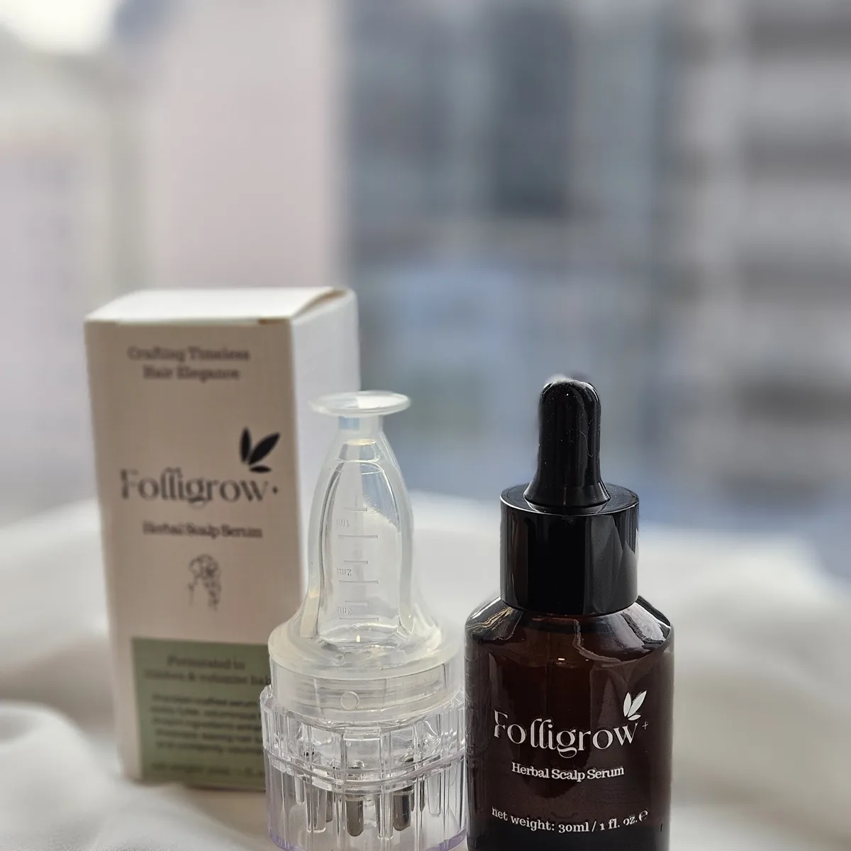 Two bottles of Folligrow+ serum